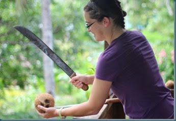 Edi opening a coconut SAT