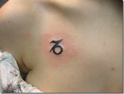 Small-Tattoo-Design-on-Chest-for-Ladies-2011-520x390