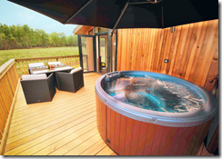 Enjoy a Glass of Festive Bubbly in the Private Hot Tub