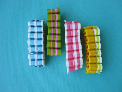 Ribbon candy flavors from left to right: Very Berry, Cotton Candy, Bubble Gum, and Pineapple.