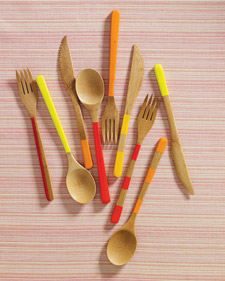 Transform reusable bamboo utensils with a few deft strokes of model paint, which can withstand hand-washing. 

To create stripes, tape off the areas you don't want painted using painters' tape; then paint, let dry, and ring the picnic bell. (marthastewart.com/266223/painted-bamboo-cutlery)