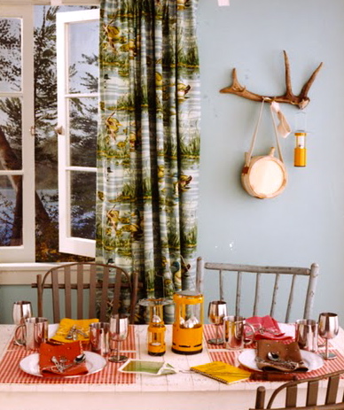 Thanks to mix-n-match chairs, lanterns, and bandanna place mats, this room screams camp.(blueprintmagazine.com) Thanks to mix-n-match chairs, lanterns, and bandanna place mats, this room screams camp.(blueprintmagazine.com)
