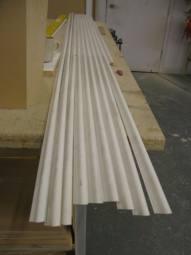 I stopped by the shop that is making the planter and saw it being put together. Here are the molding slats.
