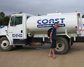 The infamous water truck that will soon be soaking us during the first mile and then again at the "Slippery Hill".