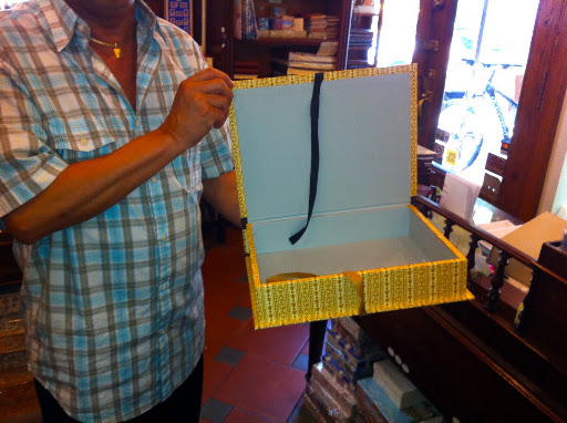 Made with acid-free paper, the box protects photographs and paper from yellowing with age.
