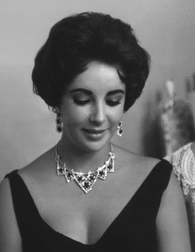 EH with her ruby-and-diamond jewelery just given to her by her husband at Villa Fiorentina. (photo from My Love Affair With Jewelry) EH with her ruby-and-diamond jewelery just given to her by her husband at Villa Fiorentina. (photo from My Love Affair With Jewelry)
