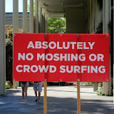 Sign at Bumbershoot: “Absolutely No Moshing or Crowd Surfing” Sign at Bumbershoot: “Absolutely No Moshing or Crowd Surfing”