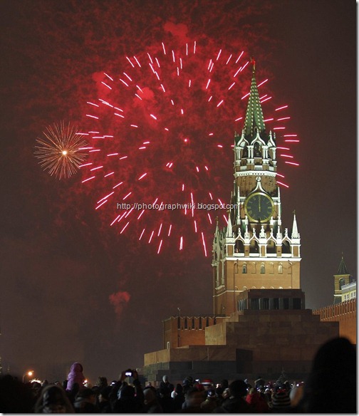 Thousands of people watched the fireworks explode during the new year's day celebration on Red Square