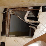 In addition to being poorly framed, what framing was near the toilet was rotted, so it all had to go. Bye bye to my new tile floor