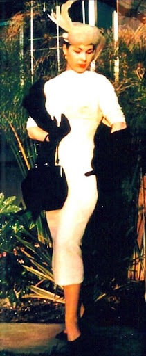 Mr. Du Puis' wife and model, Joann, wearing one of his designs.