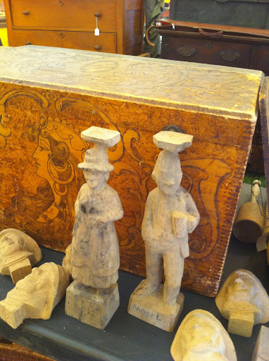 Every corner holds a new surprise at Brimfield. Here a set of hand-carved models.