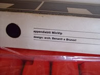 Red Velca MiniVip coat rack with packaging 2