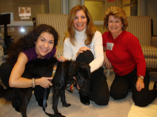 Me, Kiara, Patty and Charlene waiting to share Kiara with the world! Kiara insisted on modeling the adoption-supporting ADOPT collar and leash http://dailywag.marthastewart.com/2009/12/doggie-bling.html