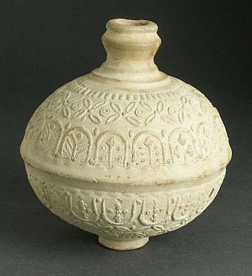 Vessel | Origin: Iraq, Iran, Syria, or Egypt | Period: first half of 8th century | Collection: The Madina Collection of Islamic Art, gift of Camilla Chandler Frost (M.2002.1.81) | Type: Ceramic; Vessel, Earthenware, molded, Height: 5 3/4 in. (14.61cm); Circumference (at widest point): 16 7/8 in. (42.86 cm)