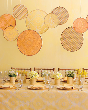 These beautiful shower hangings are made from embroidery hoops and decorative vellum paper. How chic. (marthastewartweddings.com) These beautiful shower hangings are made from embroidery hoops and decorative vellum paper. How chic. (marthastewartweddings.com)