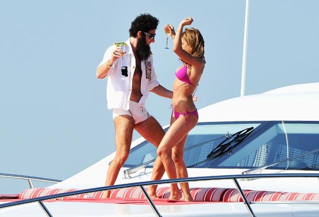 CANNES, FRANCE - MAY 16:  Admiral General Aladeen and supermodel Elisabetta Canalis spotted on a luxury yacht at Hotel Du Cap during 65th Annual Cannes Film Festival on May 16, 2012 in Cannes, France.  (Photo by Gareth Cattermole/Getty Images) *** Local Caption *** Admiral General Aladeen;Elisabetta Canalis