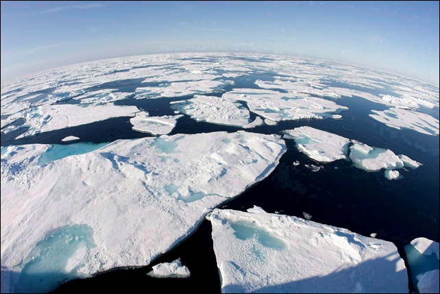 Ice floes float in Baffin Bay above the Arctic circle as seen from the Canadian Coast Guard icebreaker 'Louis S. St-Laurent' on 10 July 2008. Photo: Jonathan Hayward / The Canadian Press / Postmedia News