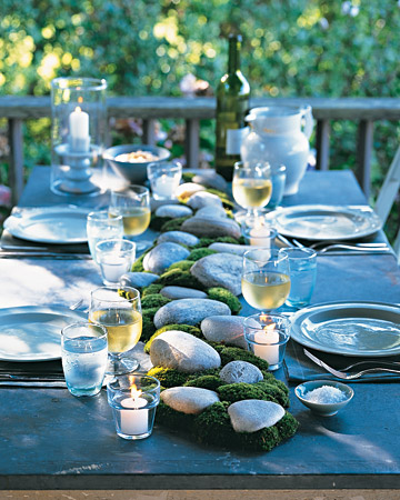 Summer: Whether the materials come from your backyard or a garden center, its easy to incorporate natural elements into the centerpiece of an alfresco dinner. Position stones down the middle of an outdoor table, and intersperse bunches of cushion moss. Summer: Whether the materials come from your backyard or a garden center, its easy to incorporate natural elements into the centerpiece of an alfresco dinner. Position stones down the middle of an outdoor table, and intersperse bunches of cushion moss.
