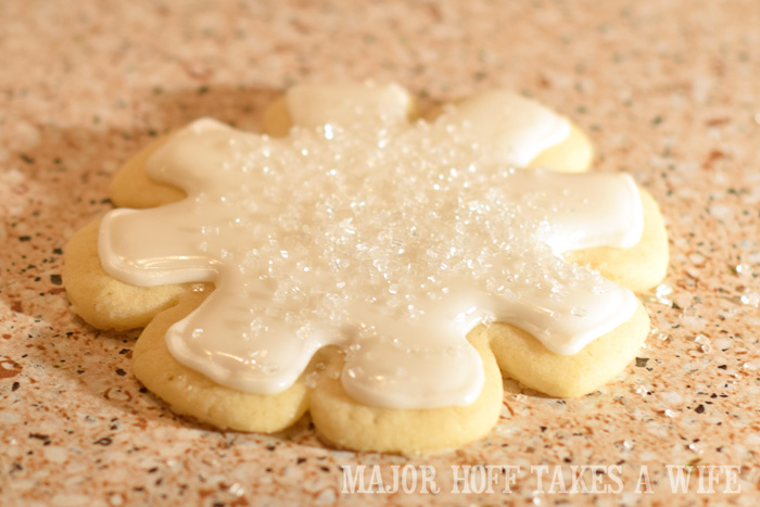 Sugar Cookie Snowflake cut out with sugar crystals. Christmas Snowflake Sugar Cookies : How to make icing and decorate. A wonderful step by step tutorial on how to make icing. You won't believe how easy it is to make! One of your favorite Christmas Cookie recipes will look stunning and elegant and truly worthy of gift giving! Because who doesn't love sugar cookies? Part of the Holidays Made Easy blog series. #HolidaysMadeEasy Christmas Snowflake Sugar Cookies : How to make icing and decorate. A wonderful step by step tutorial on how to make icing. You won't believe how easy it is to make! One of your favorite Christmas Cookie recipes will look stunning and elegant and truly worthy of gift giving! Because who doesn't love sugar cookies? Part of the Holidays Made Easy blog series. #HolidaysMadeEasy