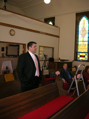 Jose Watches the Photo Taking