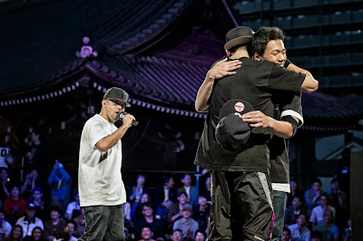 Japanese B-Boy Issei and South Korea's Vero hug after battling at Red Bull BC One Asia Pacific Final, at Kushida Shrine, in Fukuoka, Japan, on October 12, 2013. // Nika Kramer/Red Bull Content Pool // P-20131015-00122 // Usage for editorial use only // Please go to www.redbullcontentpool.com for further information. //