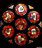 The rose window depicts a lit Menorah with the hands of God keeping His people forever. StainedWindows-1048.jpg
