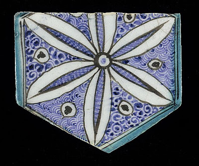 Tile | Origin: Syria or Egypt | Period: 15th century | Collection: The Madina Collection of Islamic Art, gift of Camilla Chandler Frost (M.2002.1.765) | Type: Ceramic; Architectural element, Fritware, underglaze-painted, Height: 5 13/16 in. (14.76 cm); Width: 6 7/8 in. (17.46 cm); Depth: 5/8 in. (1.59 cm)