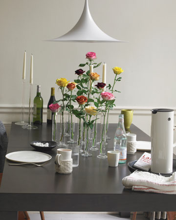 Slender vases allow individual blooms to show off their own beauty. Make sure to vary the length of the flowers you select. Slender vases allow individual blooms to show off their own beauty. Make sure to vary the length of the flowers you select.