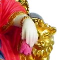 Sita Devi holding flower