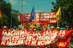 Thousands of protesters march from Liwasang Bonifacio toward the US Embassy in Manila to condemn what they call as 'puppetry of Aquino administration to US dictates.' (Photo by Ronalyn V. Olea/Bulatlat.com)