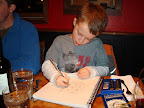Dan draws a pizza.