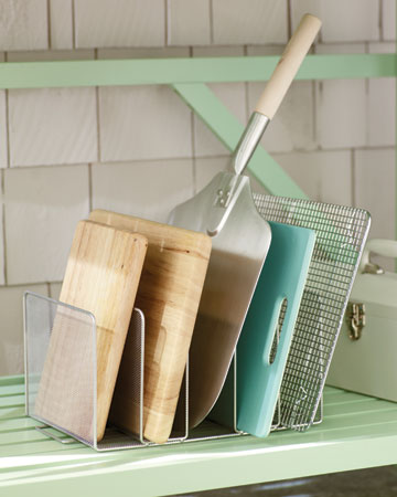 Use a file folder organizer as a clever place to store cutting boards without stacking. Use a file folder organizer as a clever place to store cutting boards without stacking.