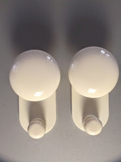 white mid century plastic wall coat hangers front 2