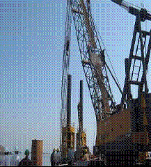 Lowering of reinforcement cage in pile casing Marine piling