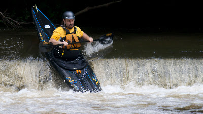 Chris running the dam above Glen Gray.