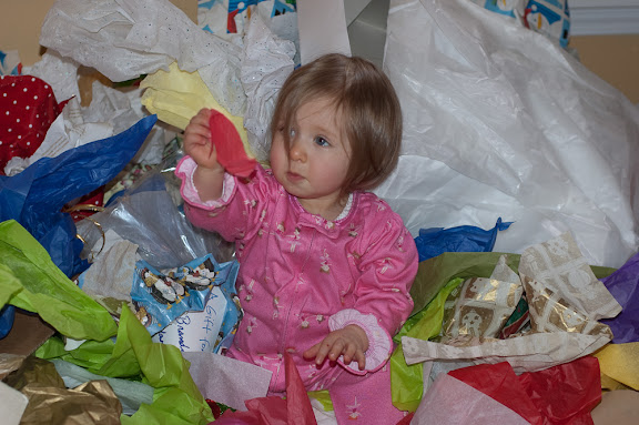 She just looks so mournful about the torn piece of tissue paper.