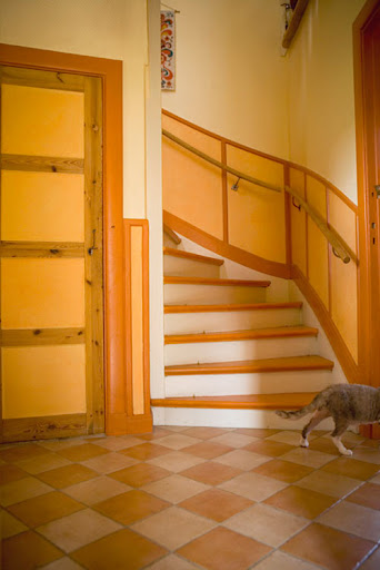 If you're comfortable with bright paints, go all out! With orange, entryways that offer good light allow multiple shades to meld gently. (www.designsponge.com) If you're comfortable with bright paints, go all out! With orange, entryways that offer good light allow multiple shades to meld gently. (www.designsponge.com)