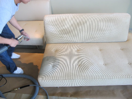 This is a hand extraction tool which is a small steam cleaner designed for upholstery.  My sofa has a cotton linen fabric so the crew used a water-based cleaner.