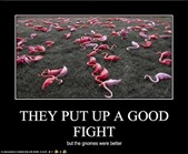 funny-pictures-the-lawn-gnomes-have-beaten-the-pink-flamingos