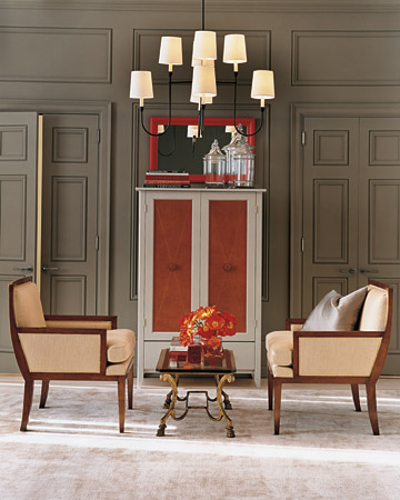This is a room that I styled for a magazine story about leather. Believe it or not, this is actually a set that we created here in our photo studios. The rust color of the leather insets of the cabinet doors and the vase of Icelandic poppies (as well as the occasional book spine) provide what I think is a beautiful and sophisticated addition of orange to the color palette of the room. This is a room that I styled for a magazine story about leather. Believe it or not, this is actually a set that we created here in our photo studios. The rust color of the leather insets of the cabinet doors and the vase of Icelandic poppies (as well as the occasional book spine) provide what I think is a beautiful and sophisticated addition of orange to the color palette of the room.