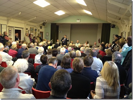 Councillor Michael Jones speaks to a packed audience at the Wistaston Parish Council meeting on 16-5-13