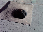 Common sight in UB. Locals remove manhole covers and sell as scrap metal.