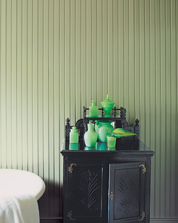 A collection of Opaline vases reflects a bluer tone on the lacquered chest. Be aware of how pieces change under various lights and against other elements. (www.marthastewart.com) A collection of Opaline vases reflects a bluer tone on the lacquered chest. Be aware of how pieces change under various lights and against other elements. (www.marthastewart.com)