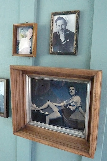 Jen and Josh set up an installation of family photos by the backyard's entrance.