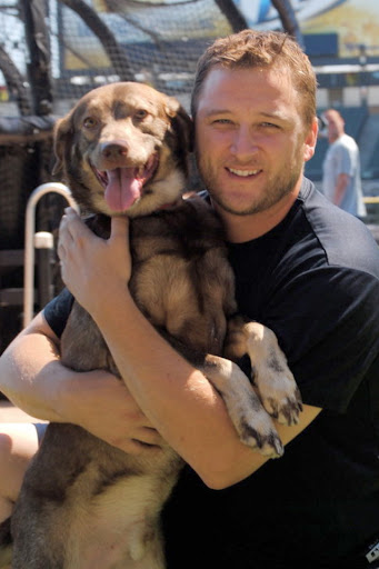 Mark poses with a cutie pie adopted out by Found Chicago rescue group, with help from the Buehrles. Mark poses with a cutie pie adopted out by Found Chicago rescue group, with help from the Buehrles.