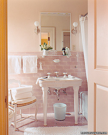 The chair and soft pinks and blues in one of Martha's bathrooms at Skylands are beautiful, and they cast a lovely glow that looks good on everyone.