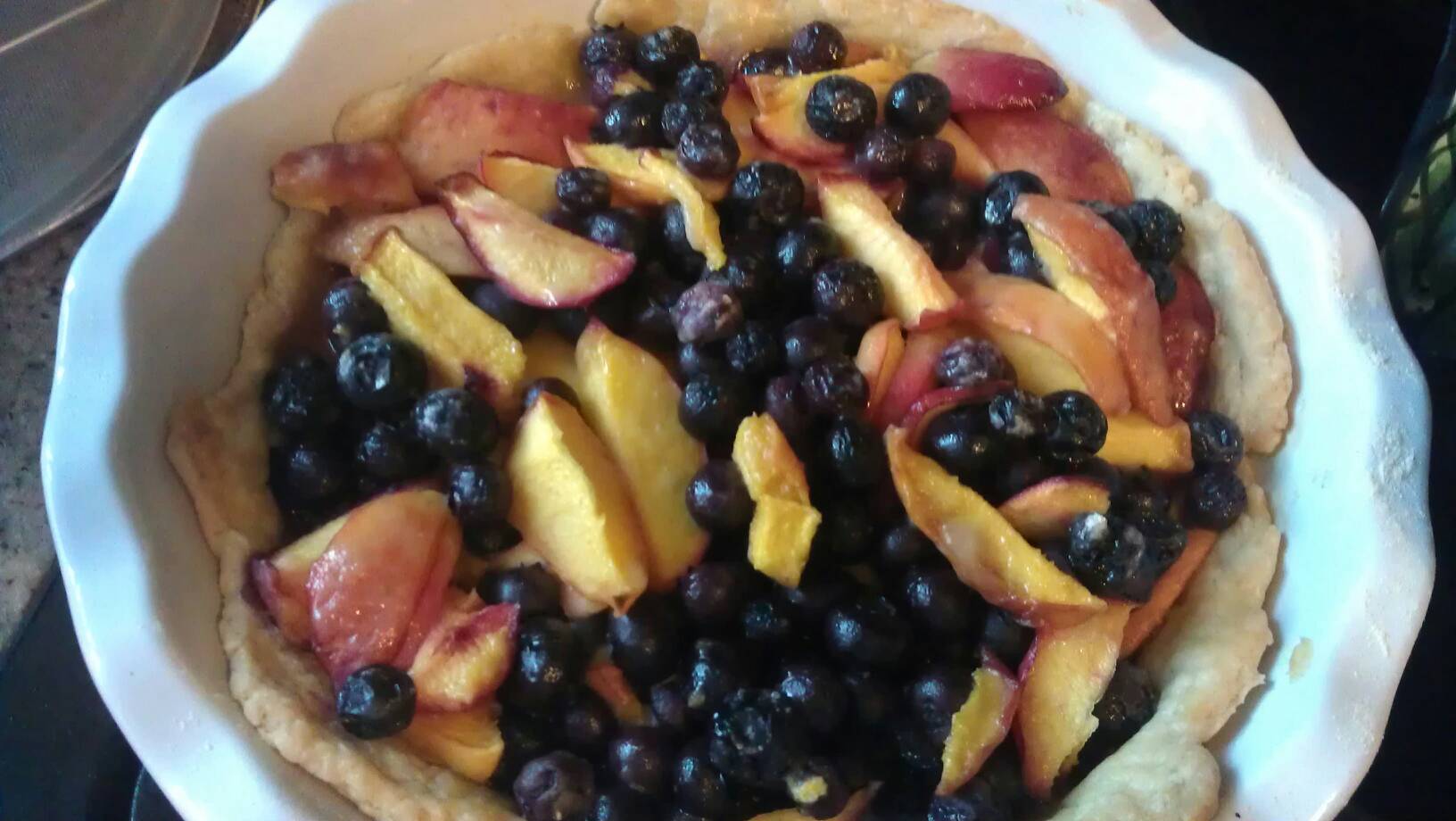 Jills peach strawberry blueberry pie