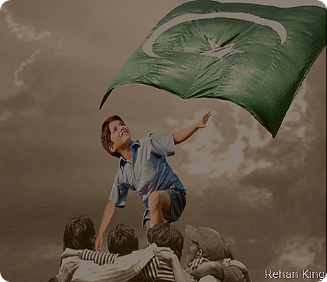 boy happy near pakistan flag