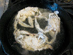 Fry them, starting on their backs in a cast iron pan with enough hot oil to come halfway up the sides of the crabs. Be advised that they may sputter or pop if there is any trapped liquid.