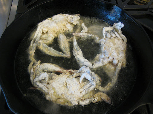 Fry them, starting on their backs in a cast iron pan with enough hot oil to come halfway up the sides of the crabs. Be advised that they may sputter or pop if there is any trapped liquid.
